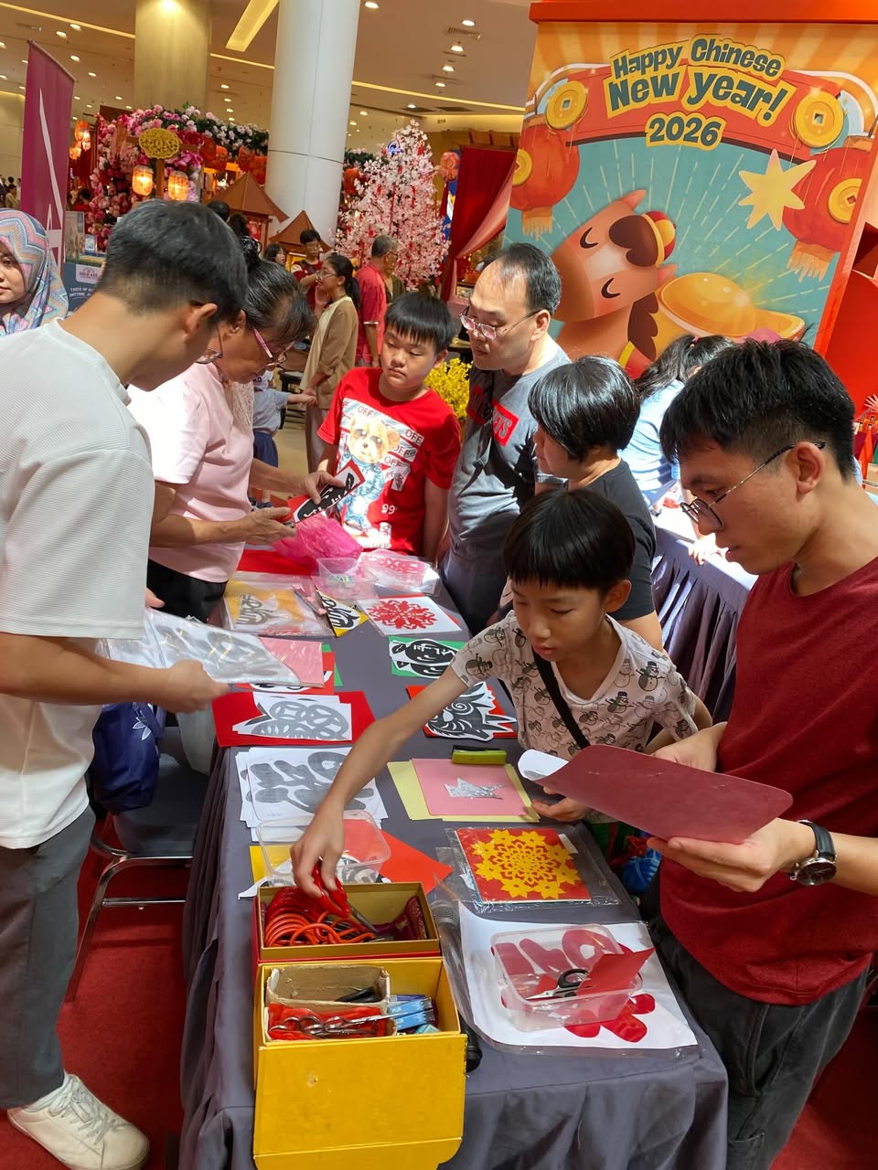 Close-up view of the fine tools and paper used in the craft