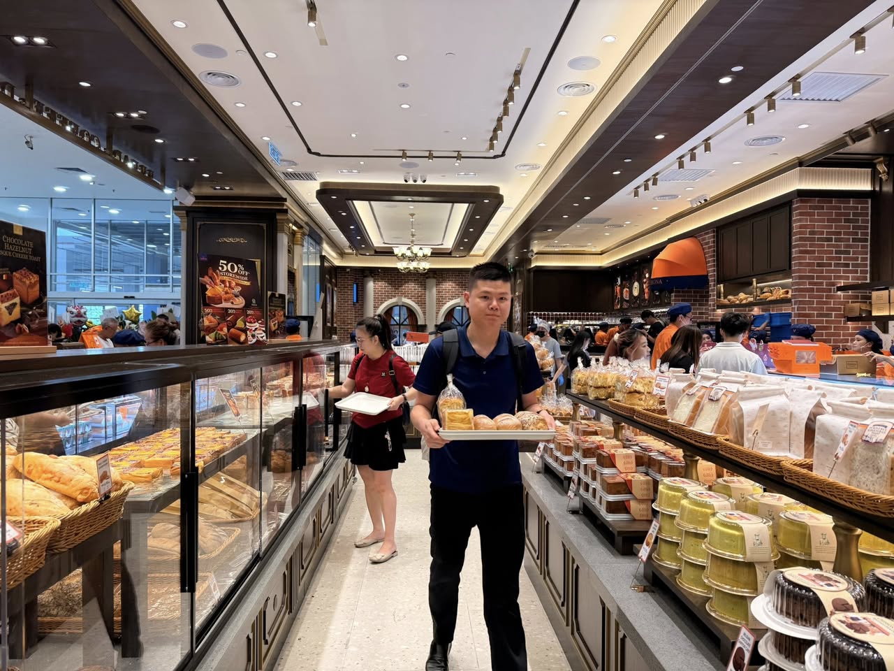 Customers enjoying freshly baked pastries inside Verrona Hills