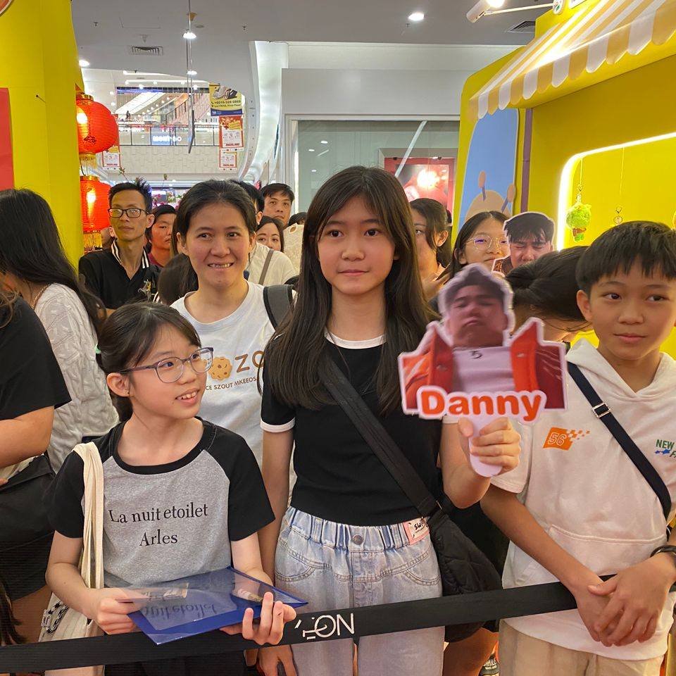 Community members and shoppers enjoying the lively atmosphere of the Meet & Greet.