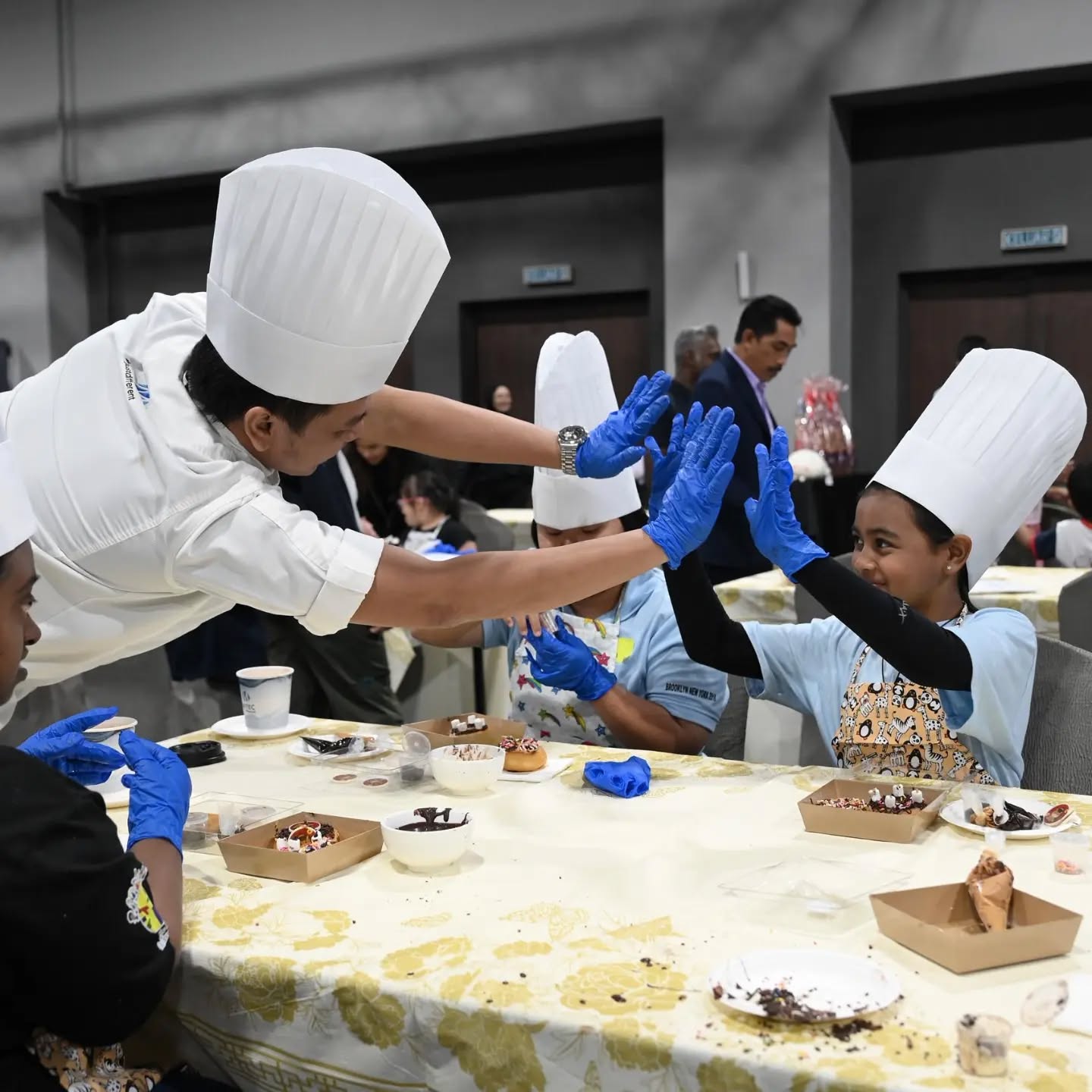 Participants and volunteers gathering at the KL Metropolis community event