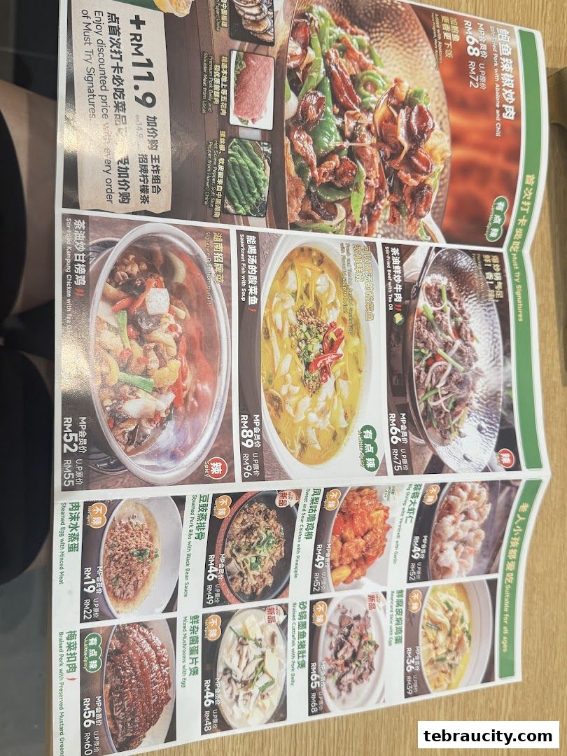 A menu from Nong Geng Ji featuring various Hunan dishes with prices and descriptions.
