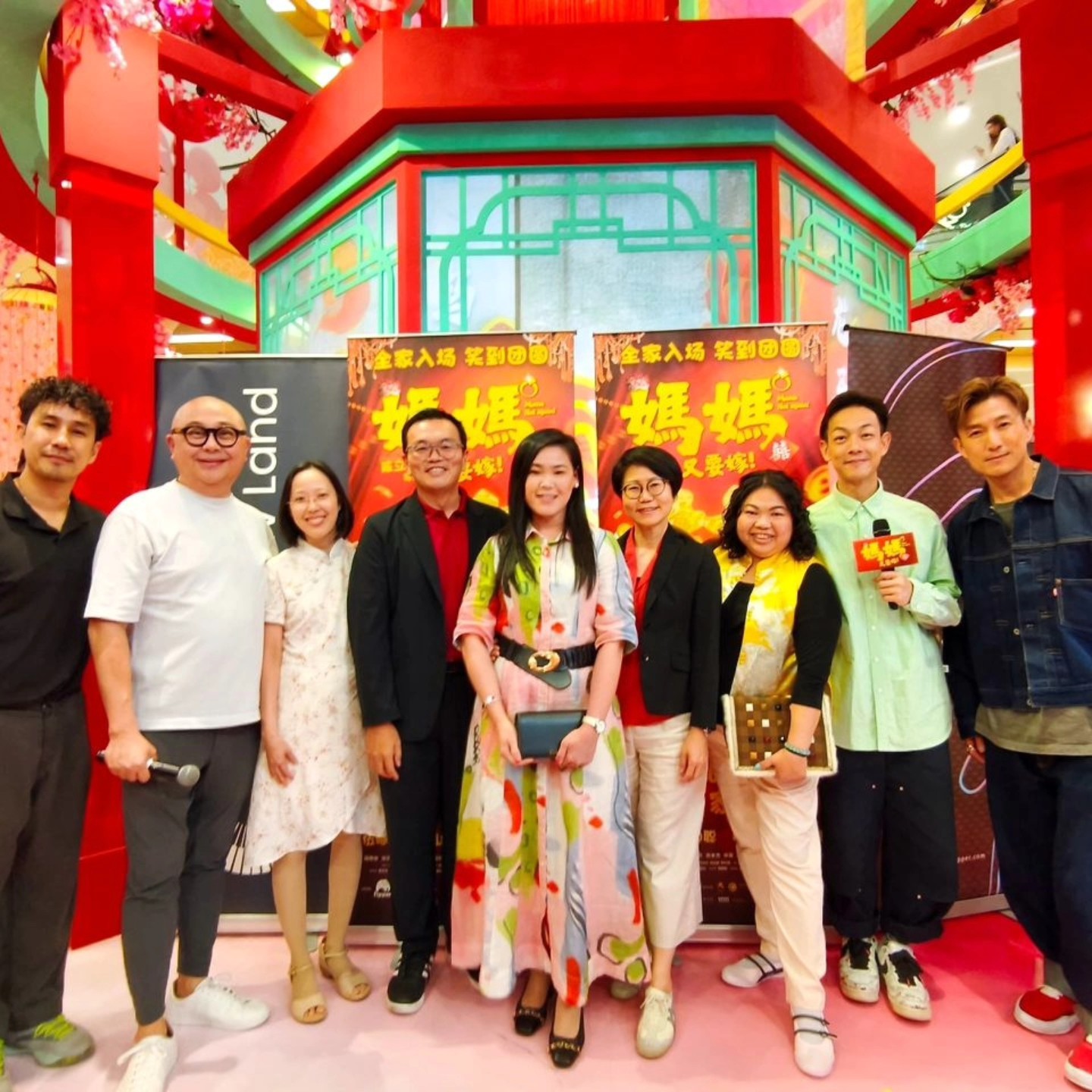 The cast and crew celebrating at the movie premiere event