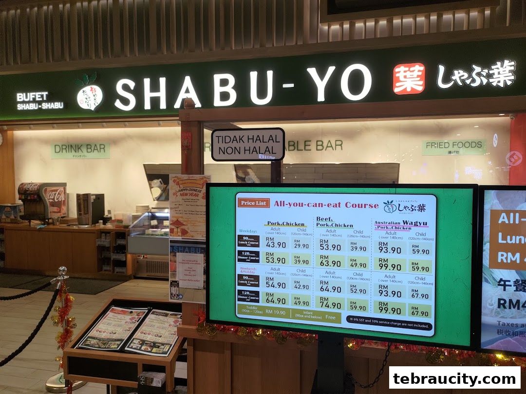 The Shabu-Yo restaurant entrance with a digital menu displaying all-you-can-eat courses.