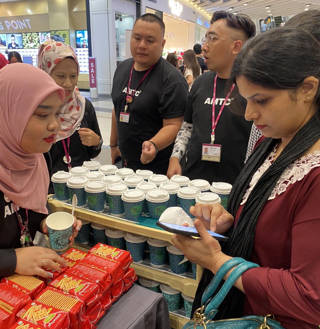 Guests enjoying treats at the evening event