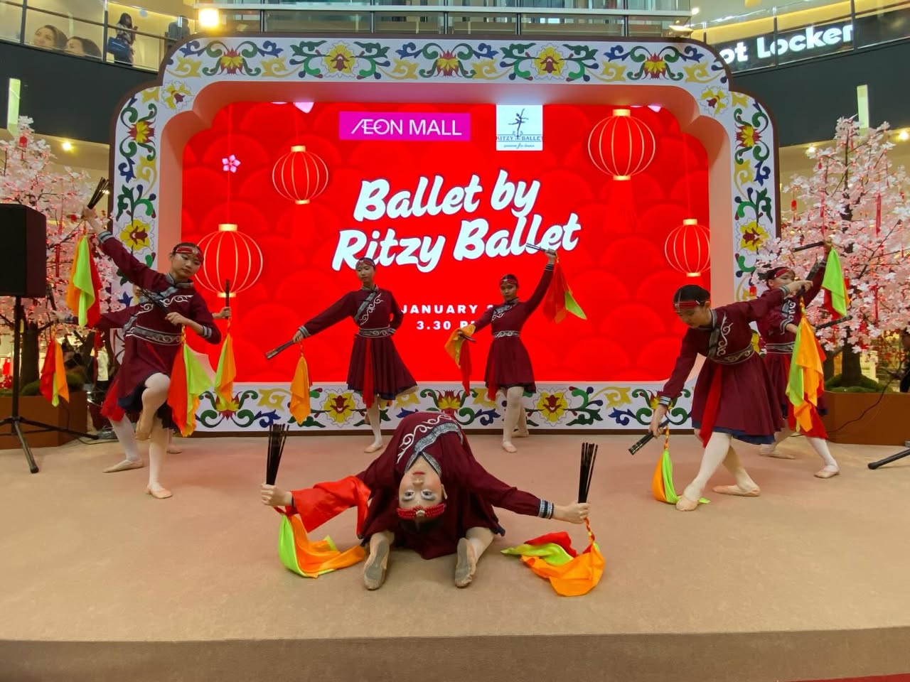 A moment of intense emotional expression during a ballet routine.