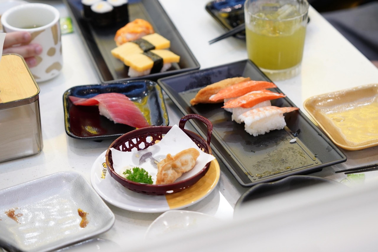 Diners enjoying their meal at the newly opened Genki Sushi