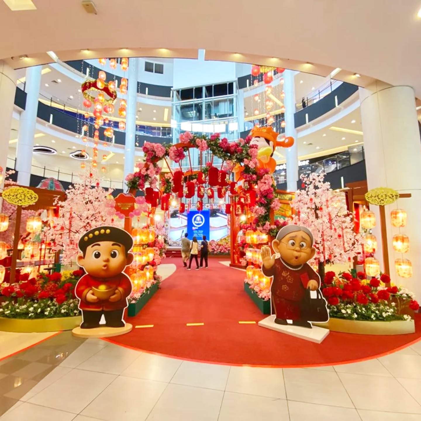 Shoppers enjoying the CNY festivities at AEON MALL