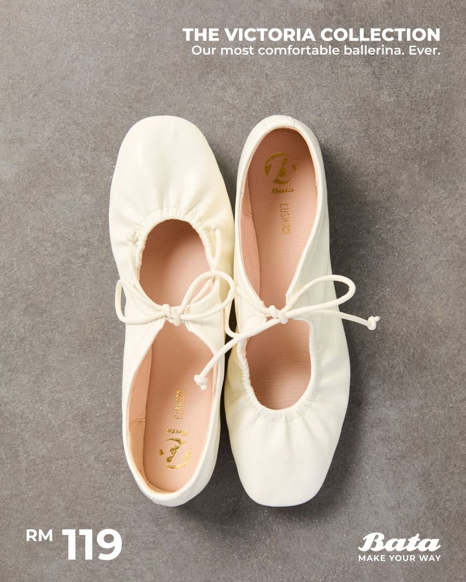 A model wearing Victoria Ballerina shoes in a casual setting.