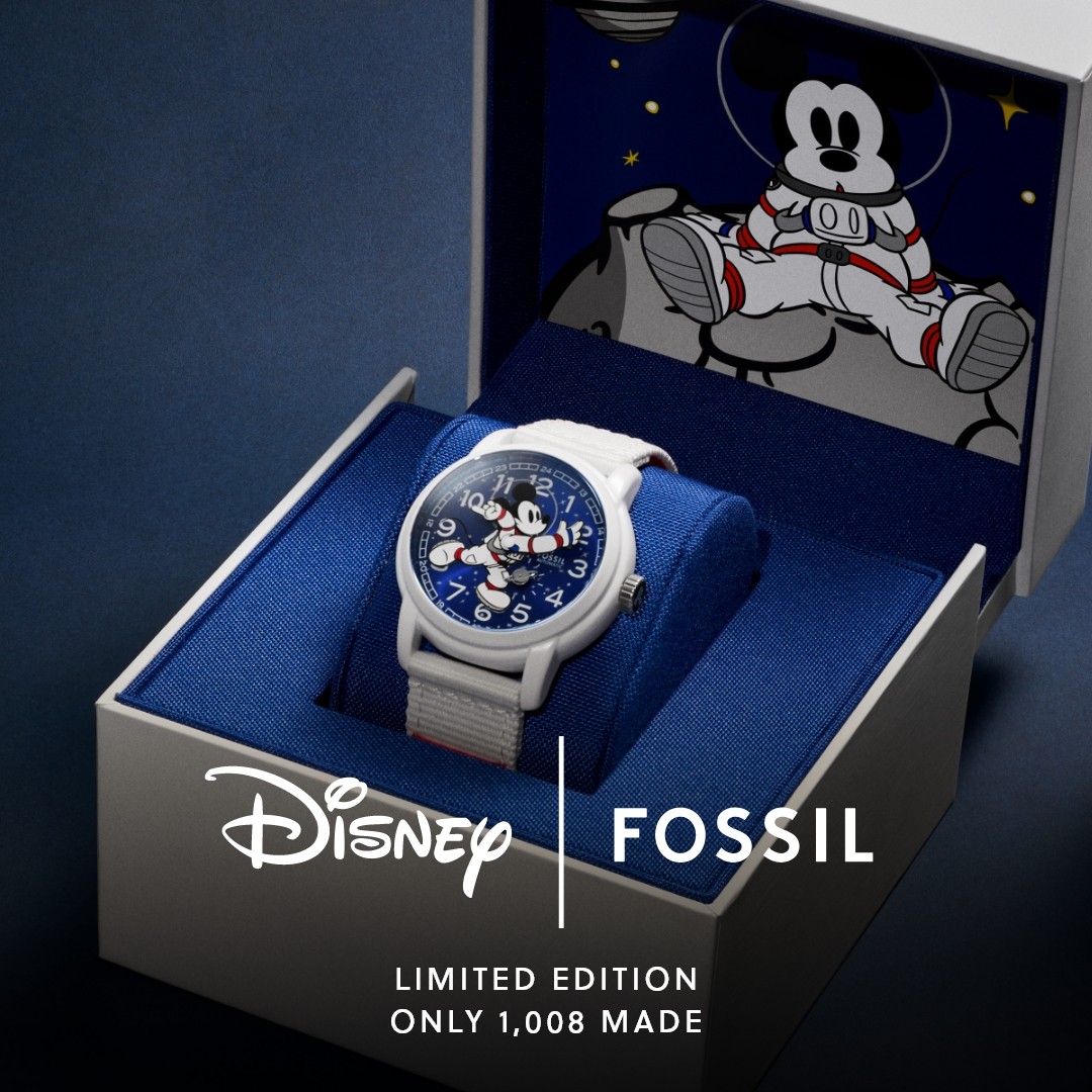 Close-up of the Disney x Fossil Heritage automatic watch featuring Mickey Mouse in a spacewalk suit