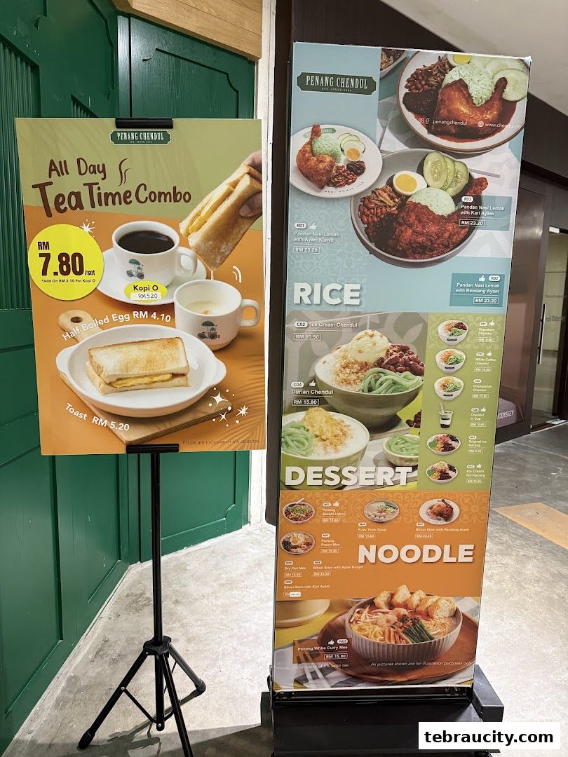 A display board showcasing food and drink items from Penang Road Famous Teochew Chendul.