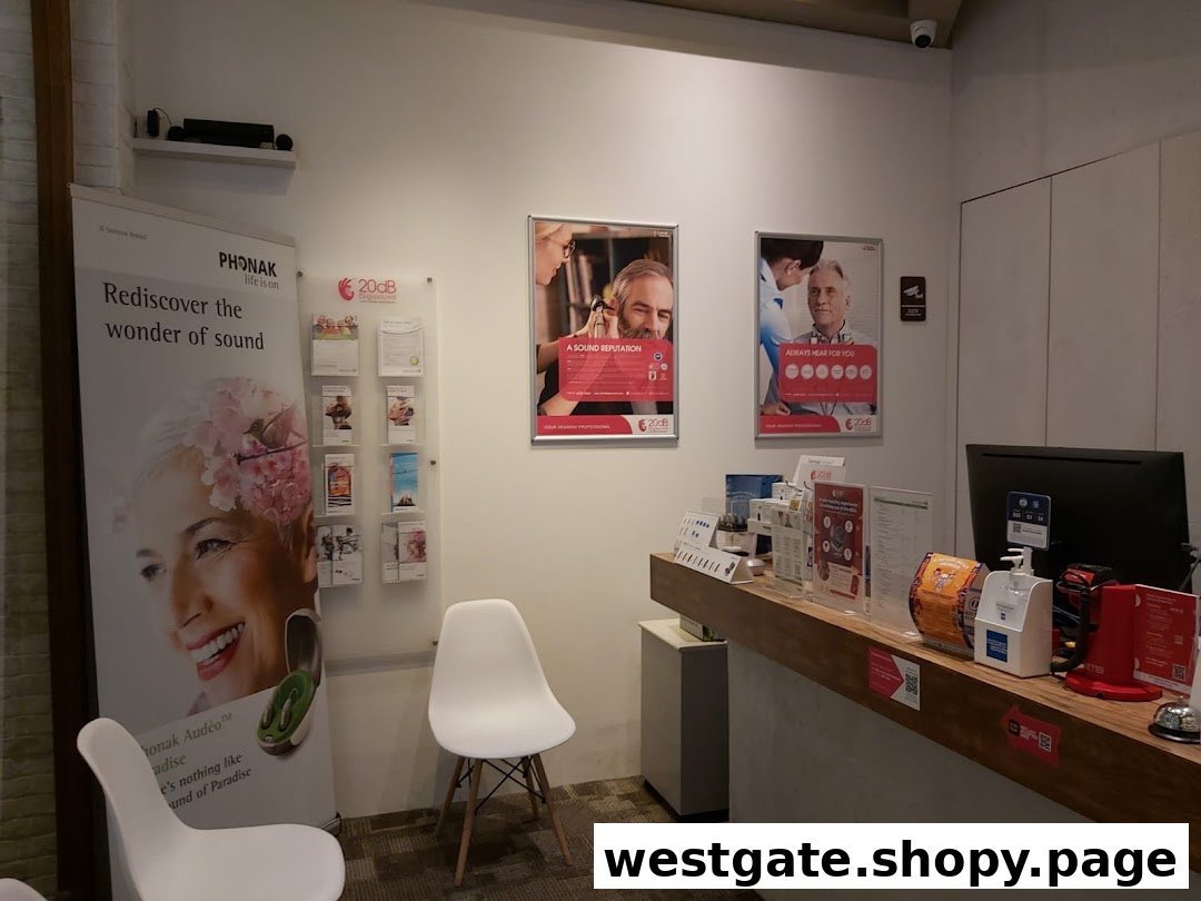 Interior view of 20dB Digisound, featuring a reception desk, promotional displays, and seating area.
