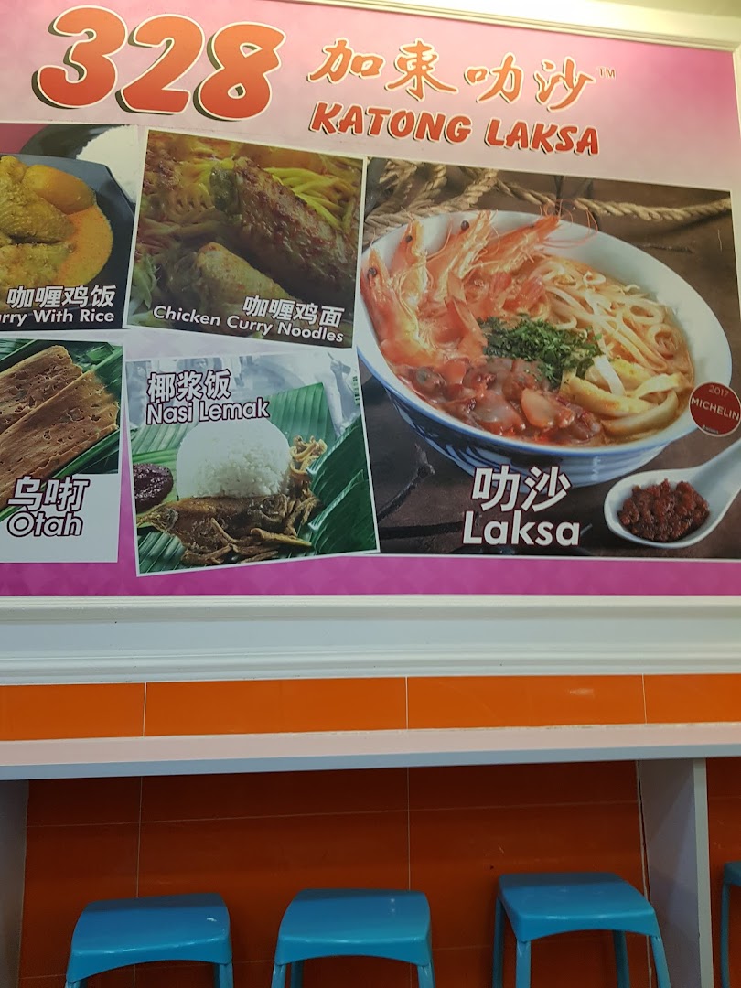 A vibrant menu board showcasing 328 Katong Laksa's signature dishes, including Laksa and Nasi Lemak.