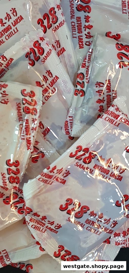 Close-up of numerous 328 Katong Laksa Sambal Chilli packets.
