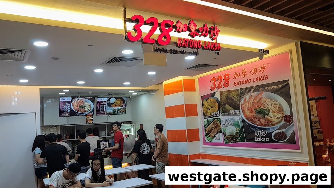 Interior view of 328 Katong Laksa, showing customers, counter, and large menu displays featuring their famous laksa.