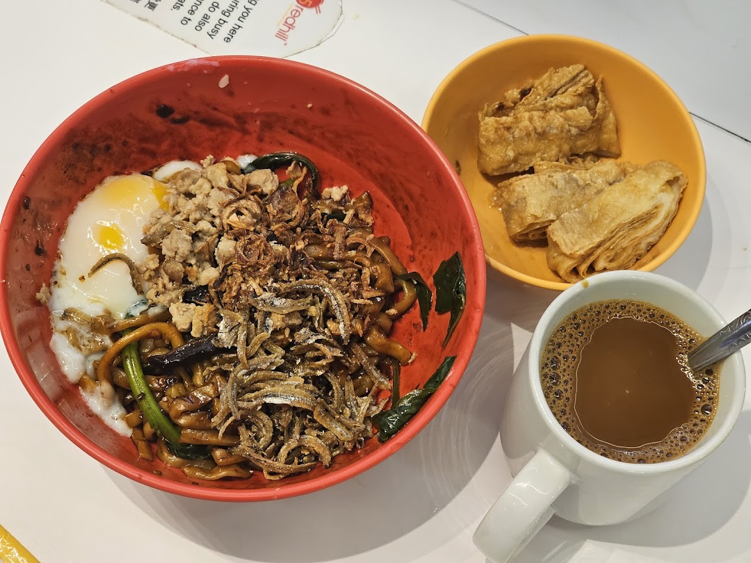 A hearty bowl of Teochew noodles with egg, anchovies, minced meat, fried beancurd, and coffee.
