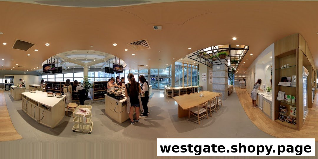 An interior view of ABC Cooking Studio showing a cooking class in progress and a retail display area.