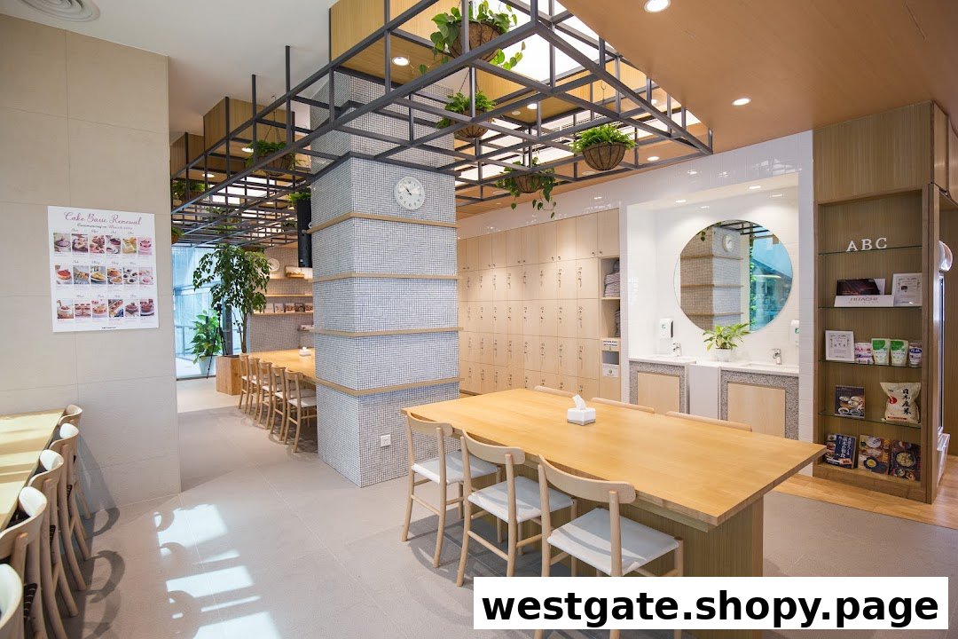 Bright, modern interior of ABC Cooking Studio with long wooden tables, lockers, and a display.