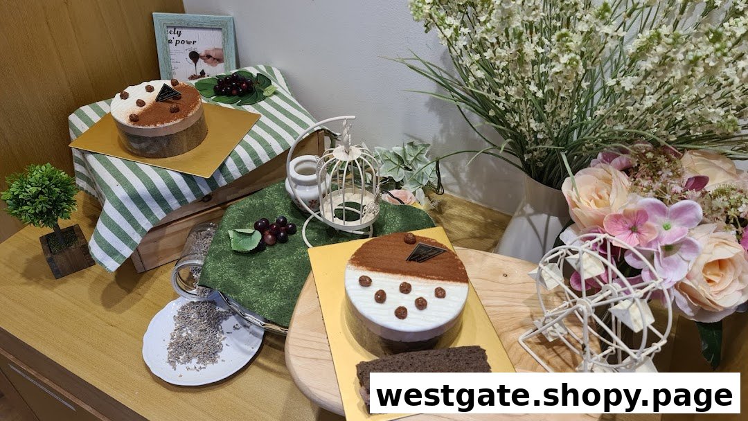 A delightful display of two cakes and a chocolate bar, showcasing baking creations.