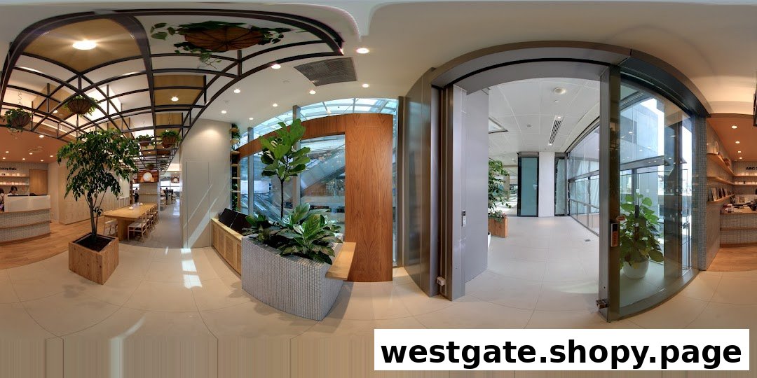 A panoramic view of ABC Cooking Studio's modern and spacious interior with cooking stations and reception.