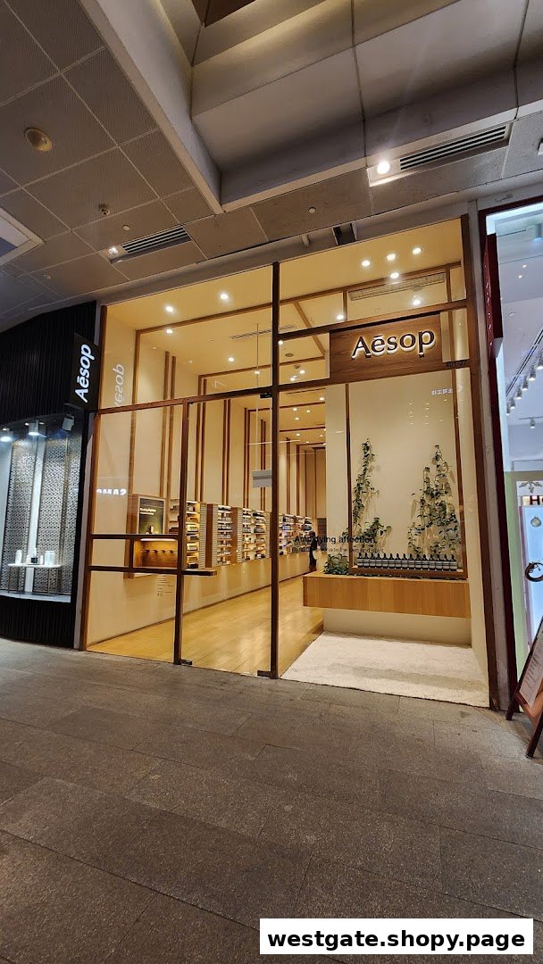 The elegant storefront of an Aesop boutique, showcasing its minimalist design and natural product displays.