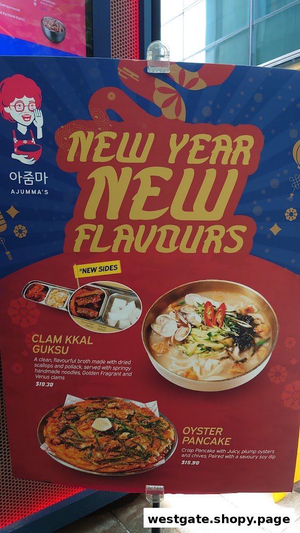 A promotional poster for Ajumma's featuring New Year special dishes and new sides.