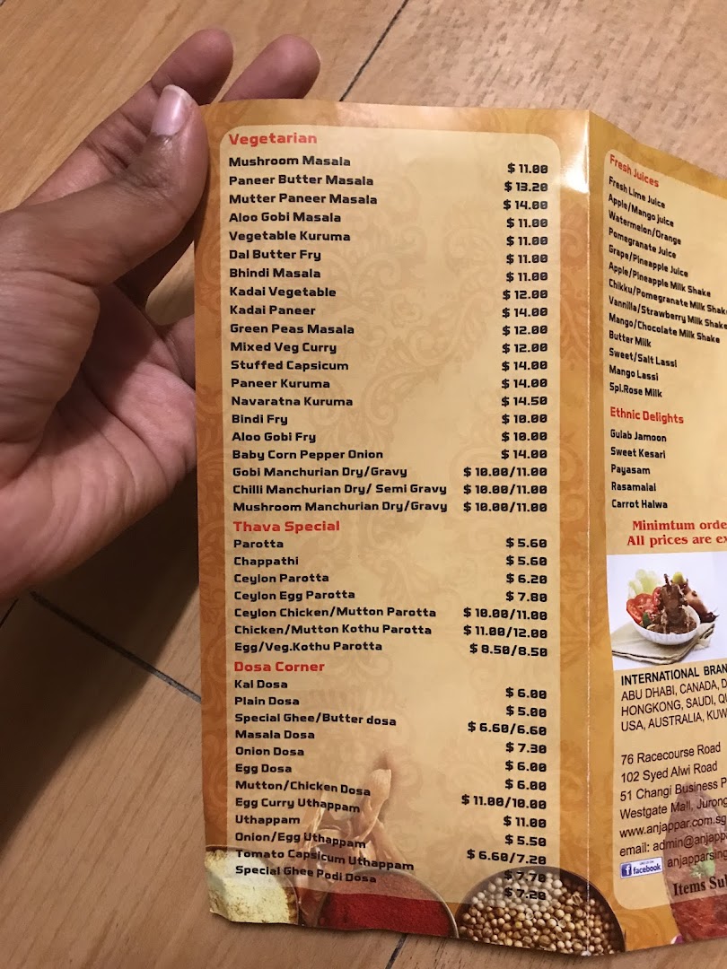 A detailed menu from Anjappar, showcasing a variety of South Indian vegetarian and non-vegetarian dishes, juices, and desserts.