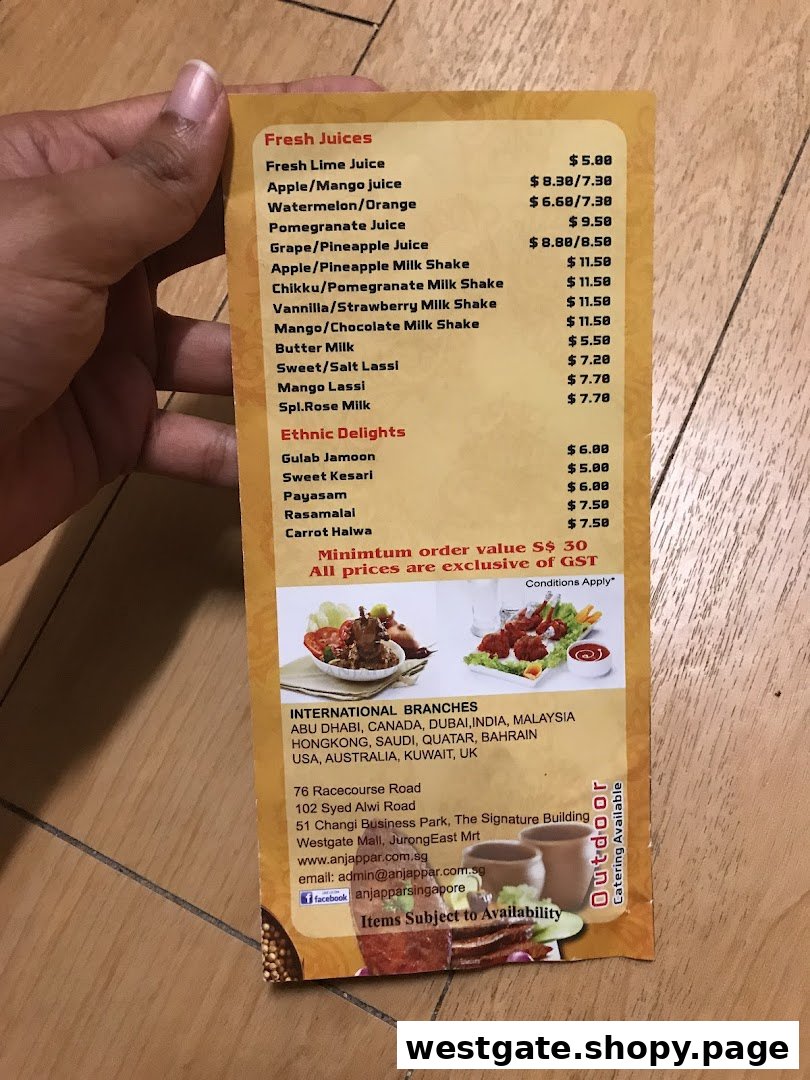 A close-up view of Anjappar's menu, featuring fresh juices and ethnic delights with prices.