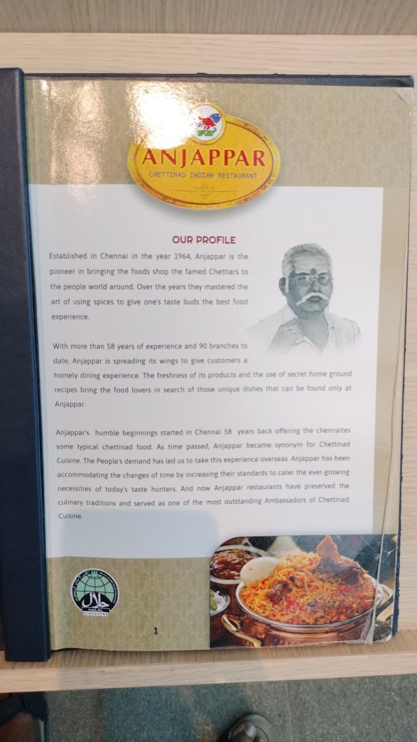 A profile page from Anjappar's menu, detailing its history, Chettinad cuisine, and dining experience.