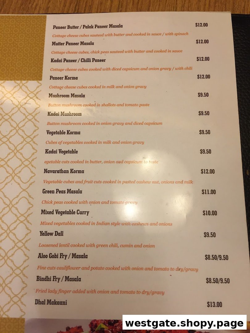 A detailed menu page showcasing a variety of vegetarian Indian main courses with prices and descriptions.