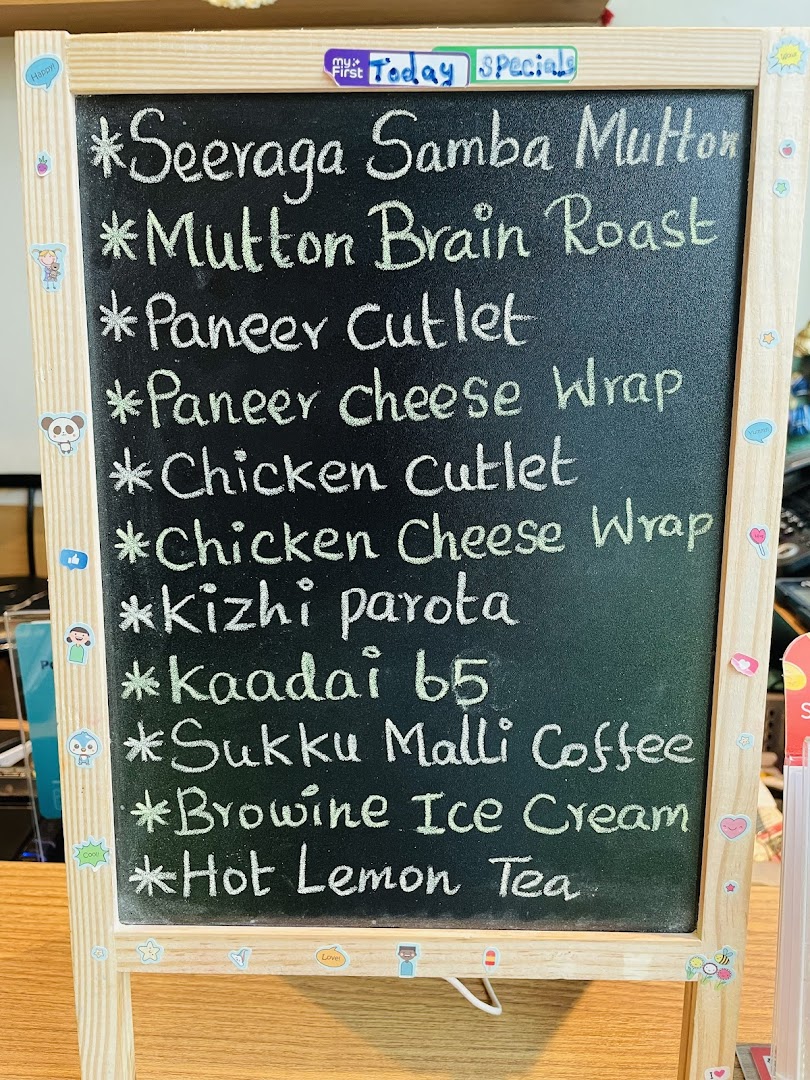 A blackboard displaying Anjappar's daily specials and menu items written in chalk.