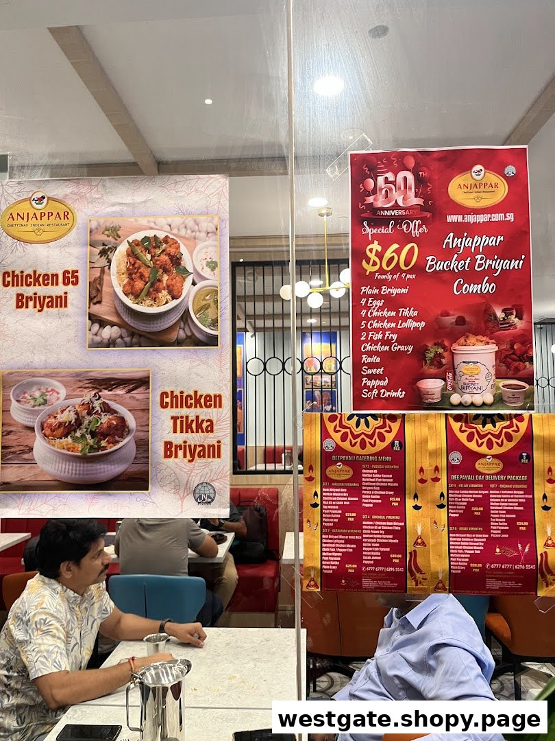 Interior view of Anjappar restaurant showcasing special offers and Deepavali catering menus.