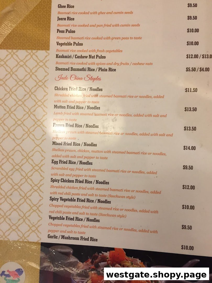 A detailed menu displaying various rice and Indo-Chinese noodle dishes with prices.
