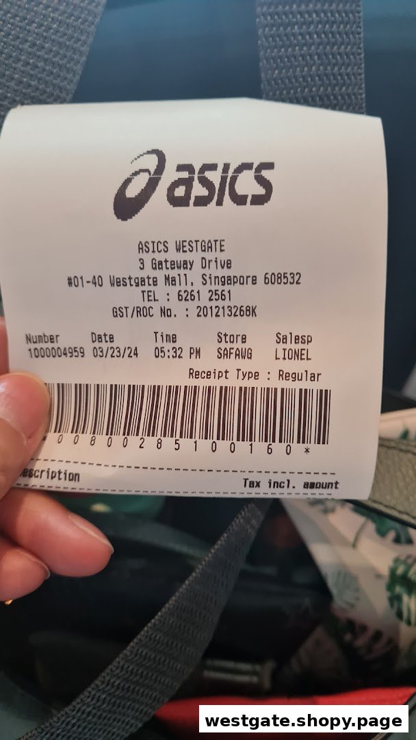 A close-up view of a retail receipt from the ASICS Westgate store, showing transaction details.