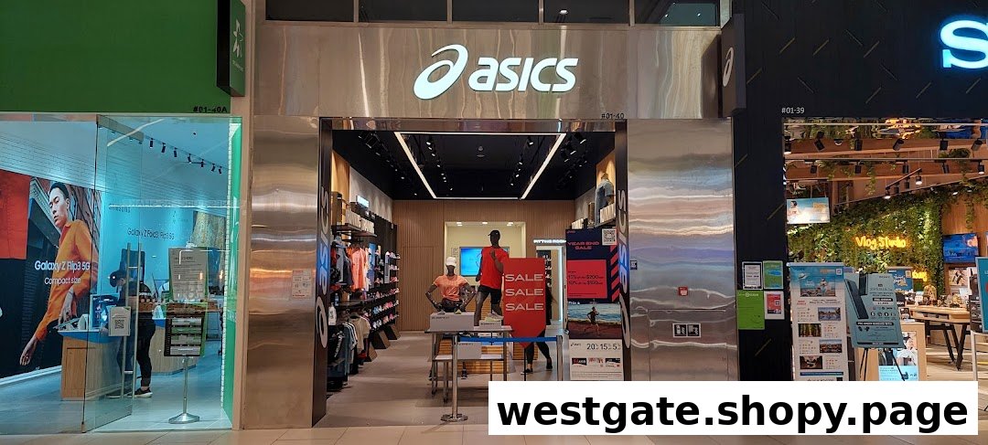The ASICS retail store entrance, showcasing athletic apparel, footwear, and prominent 'SALE' signs.