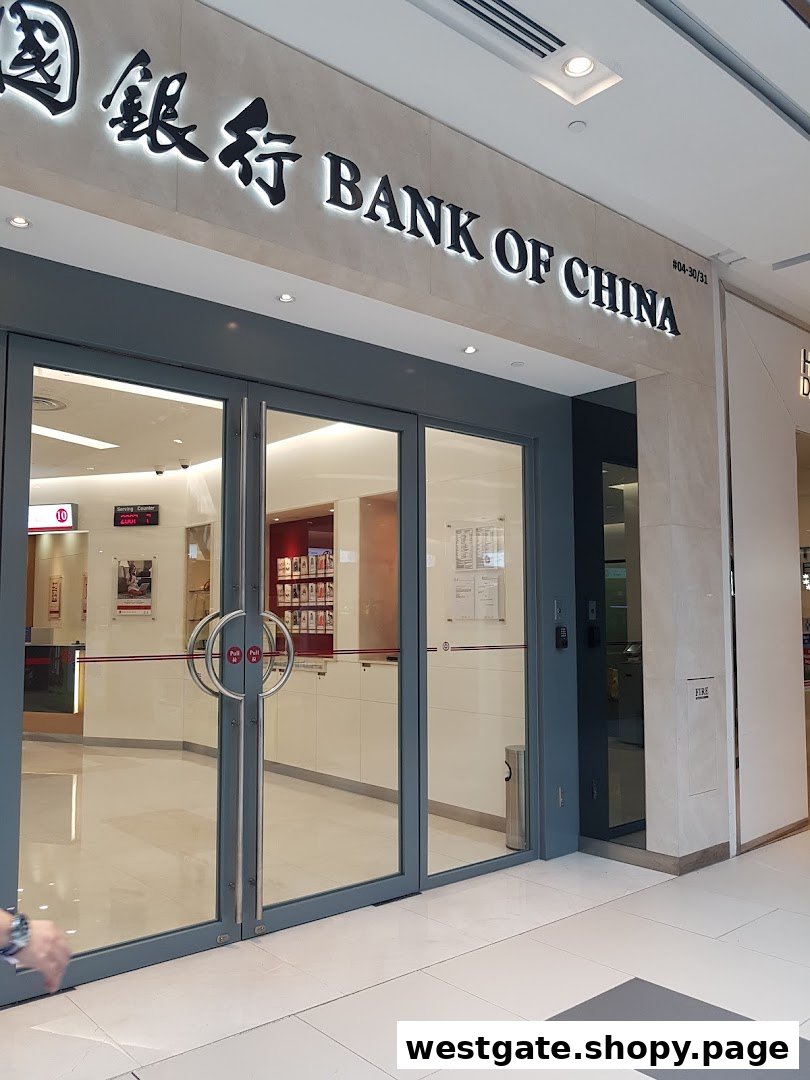 The illuminated entrance of Bank of China Jurong East Sub-Branch within a shopping mall.