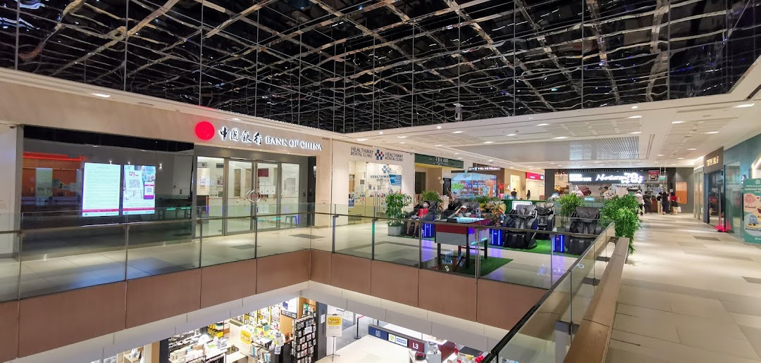 The Bank of China Jurong East Sub-Branch entrance within a bustling shopping mall, offering financial services.
