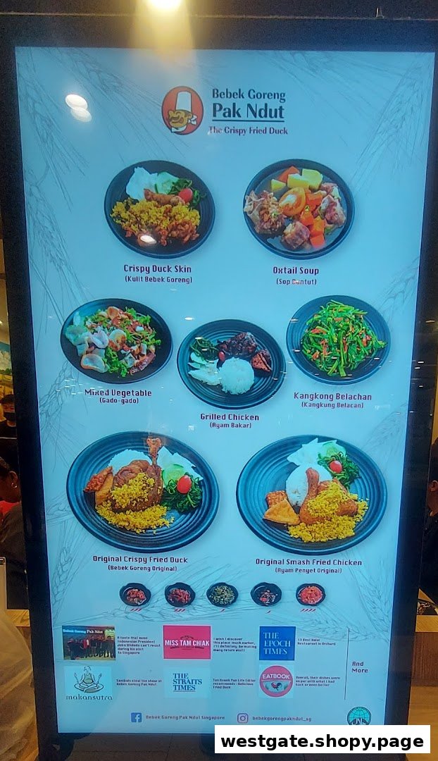 Digital menu board showcasing Indonesian dishes from Bebek Goreng Pak Ndut.
