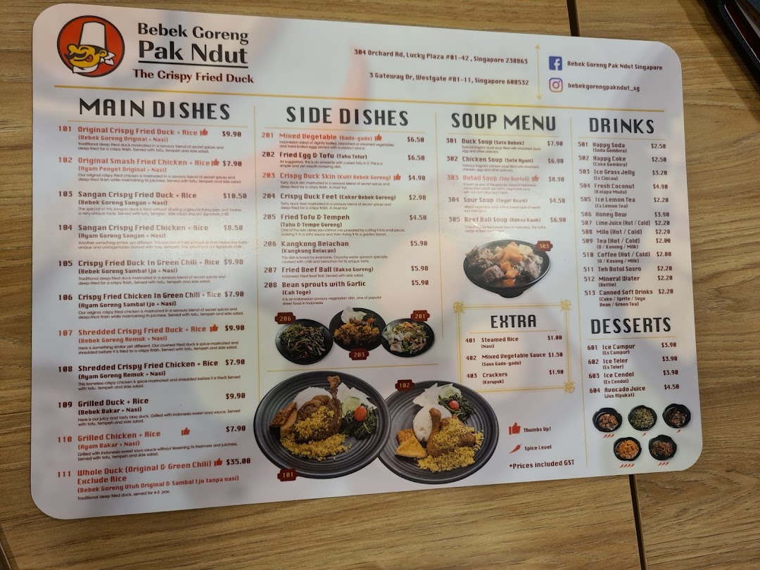 A detailed menu for Bebek Goreng Pak Ndut, featuring main dishes, sides, soups, drinks, and desserts.