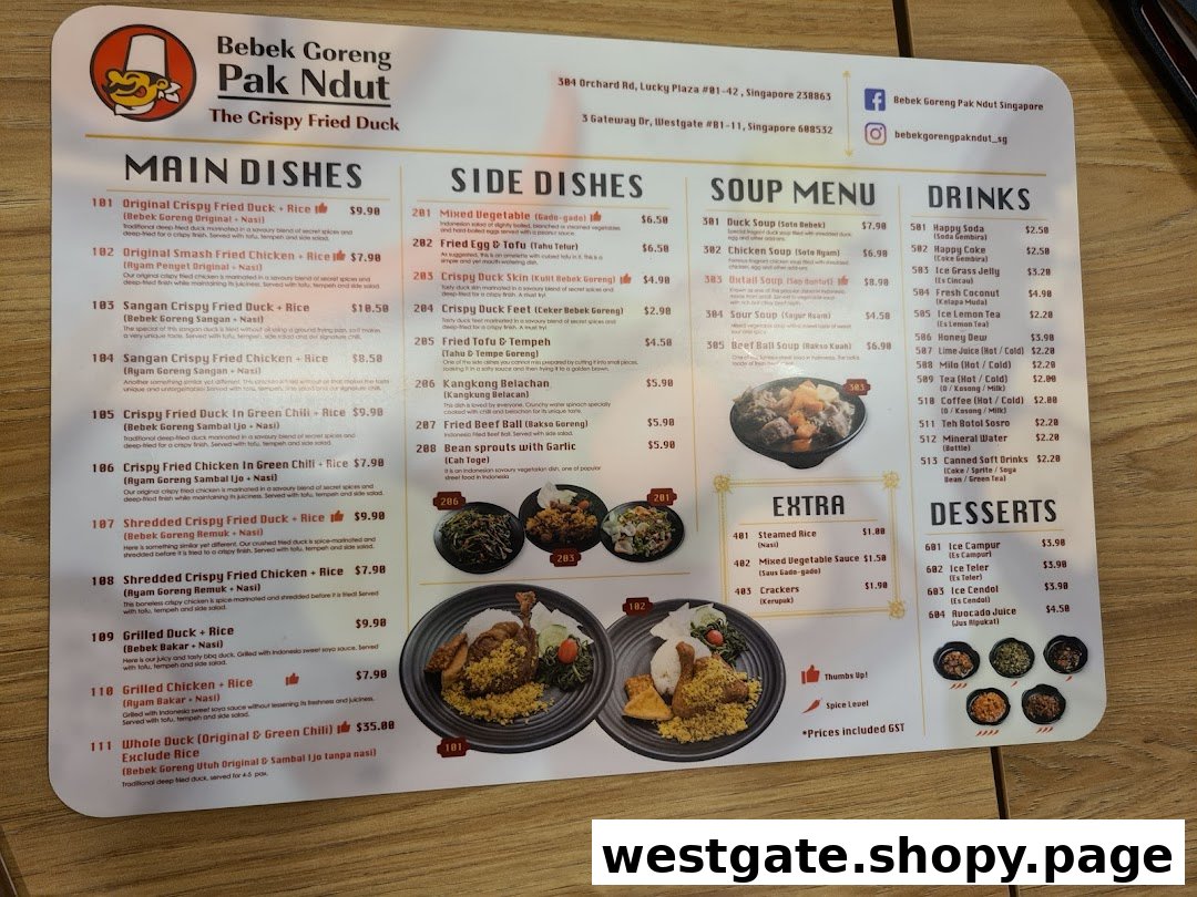 A detailed menu for Bebek Goreng Pak Ndut, featuring main dishes, sides, soups, drinks, and desserts.