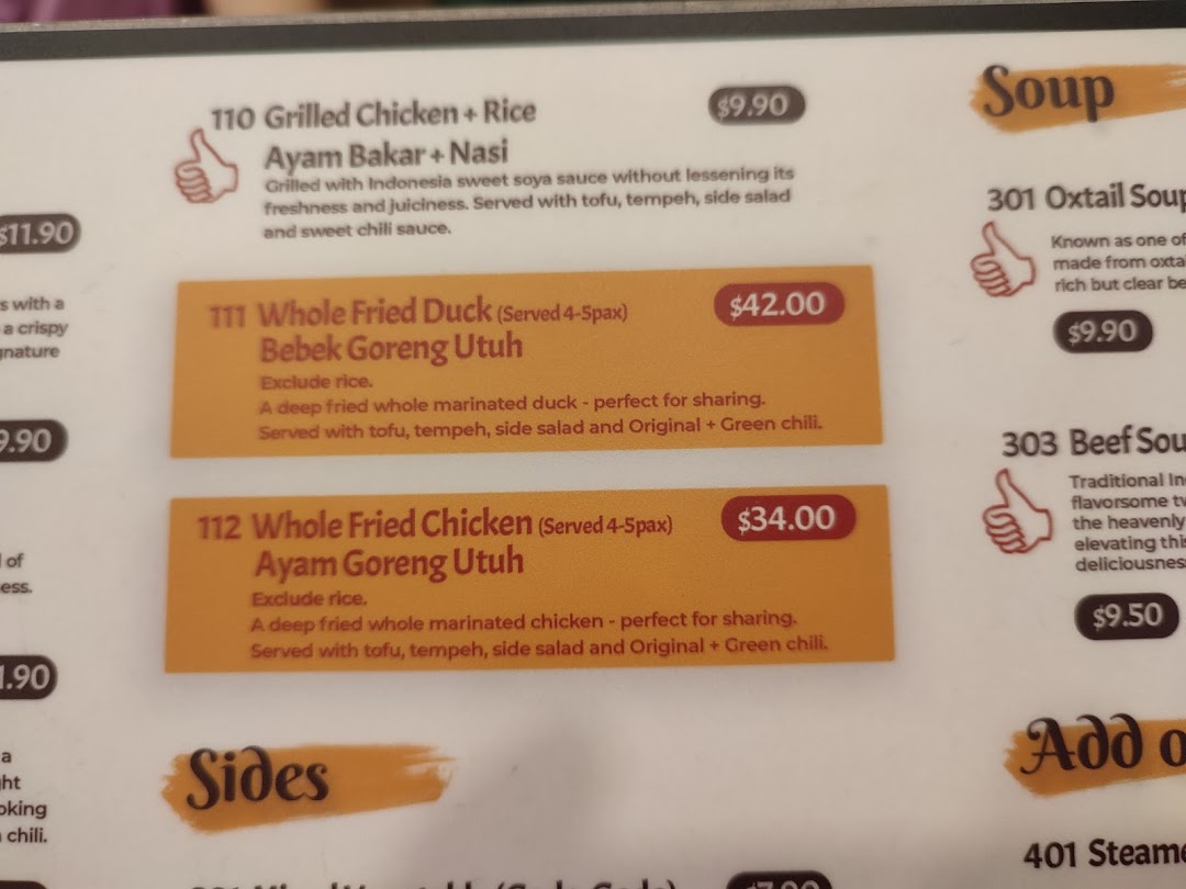 A close-up view of the menu displaying various Indonesian dishes and their prices.