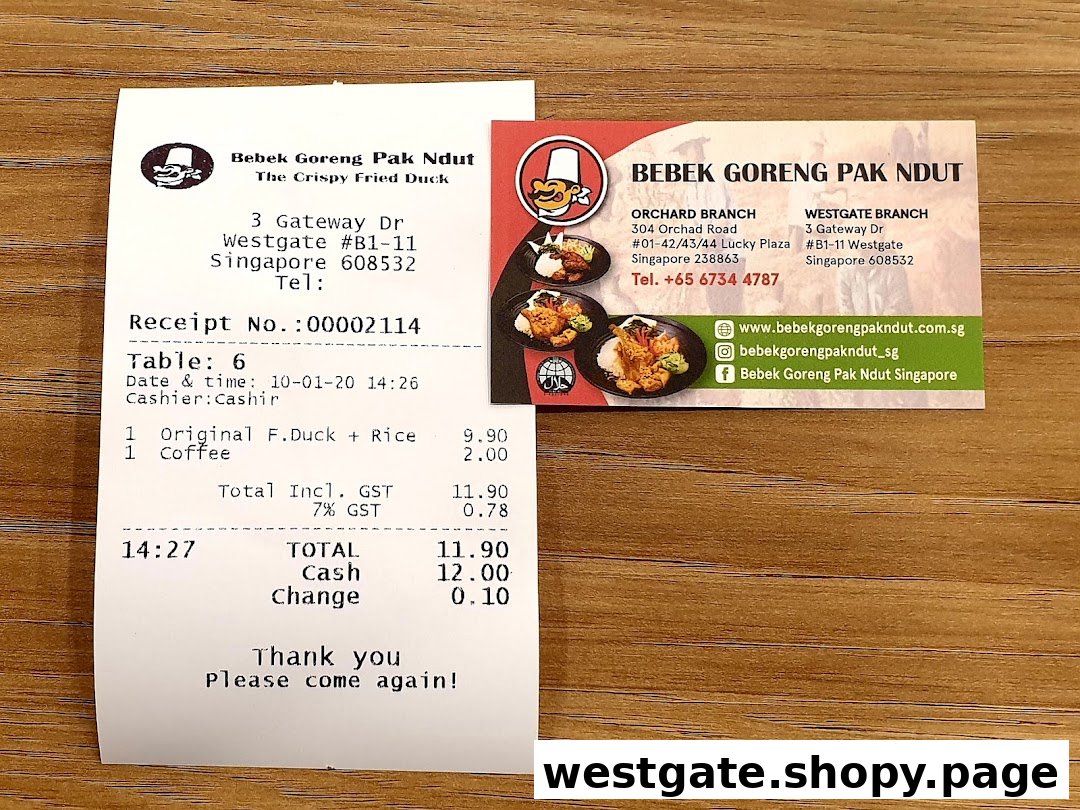 A receipt and business card for Bebek Goreng Pak Ndut, featuring contact details and branch information.