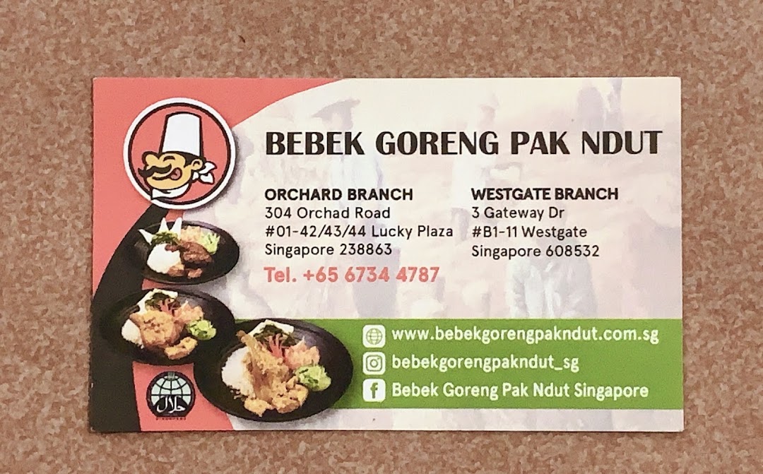Business card for Bebek Goreng Pak Ndut, featuring branch details, contact info, and social media.