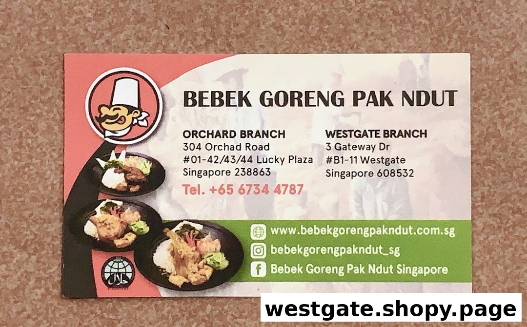 Business card for Bebek Goreng Pak Ndut, featuring branch details, contact info, and social media.
