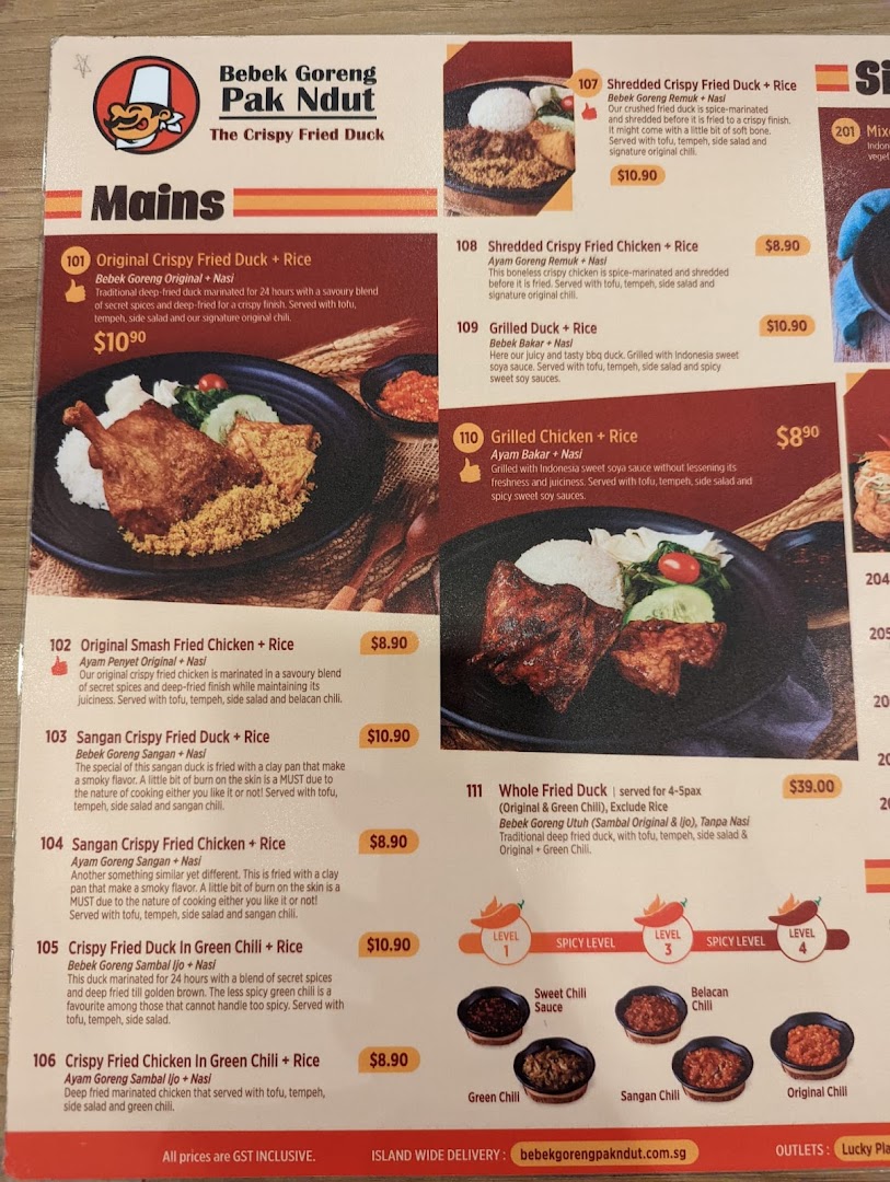 A detailed menu showcasing crispy fried duck and chicken dishes with prices and descriptions.