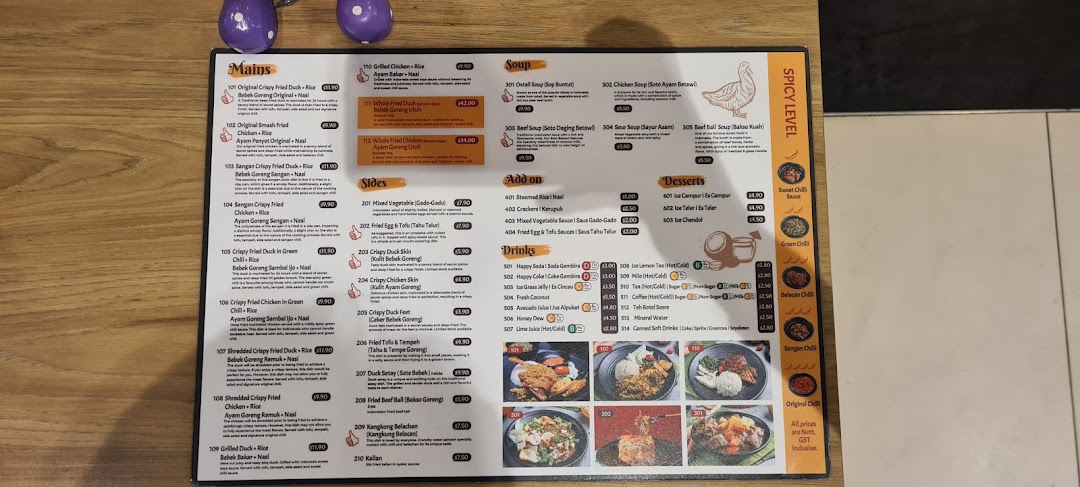 A detailed menu displaying a variety of Indonesian dishes, including mains, sides, soups, desserts, and drinks.
