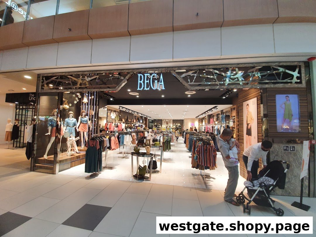 The shop front of BEGA, a fashion store, showcasing clothing on mannequins and racks, with shoppers outside.