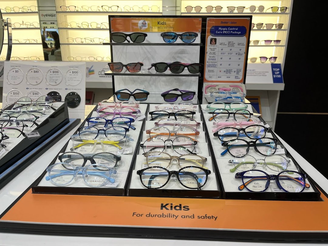 A vibrant display of children's eyeglasses and sunglasses, featuring various styles and a Myopia Control Care package.
