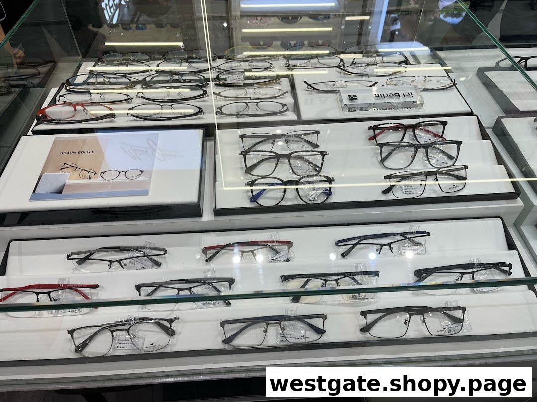 A display case showcasing a wide selection of stylish eyeglasses and frames from various brands.