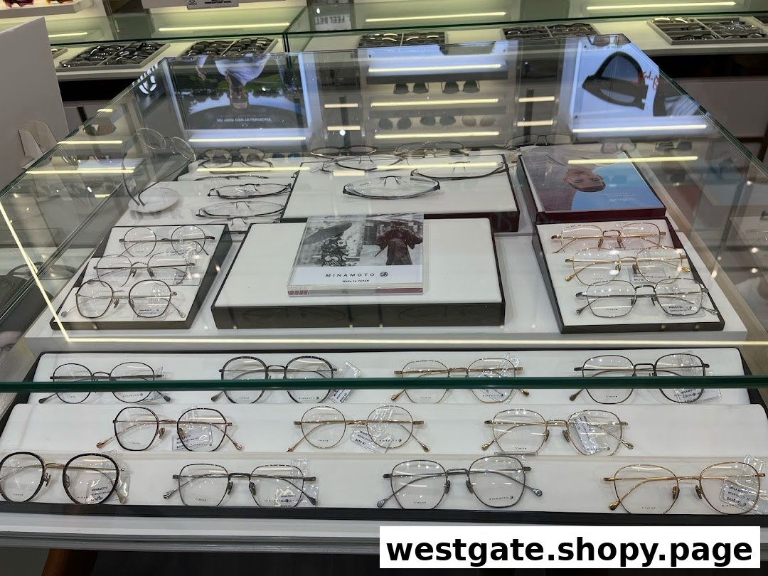 A glass display case showcasing a wide selection of modern eyeglasses and frames.