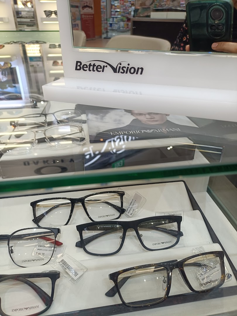A display of stylish Emporio Armani eyeglasses at Better Vision, showcasing various frame designs.